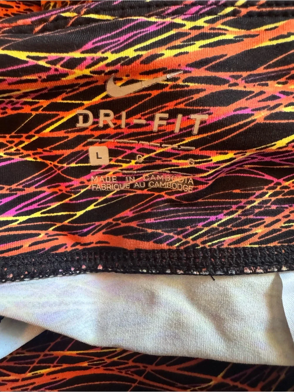 Nike Black Leggings with Neon Orange, Pink & Yellow Abstract Streaks
